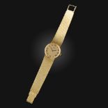 Baume & Mercier, a lady's 18ct gold wristwatch, the textured gold dial with black Roman numeral