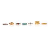 A group of 7 rings, including a diamond two-stone ring, set in platinum and gold, size P, a