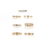 A group of six diamond rings, comprising: one diamond full eternity ring, size K, British