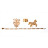 A collection of jewellery, comprising: a gold brooch designed as a horse, pavé-set with brilliant-