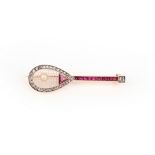 An early 20th century gem-set tennis racket brooch, set with carved rock crystal, diamonds, rubies