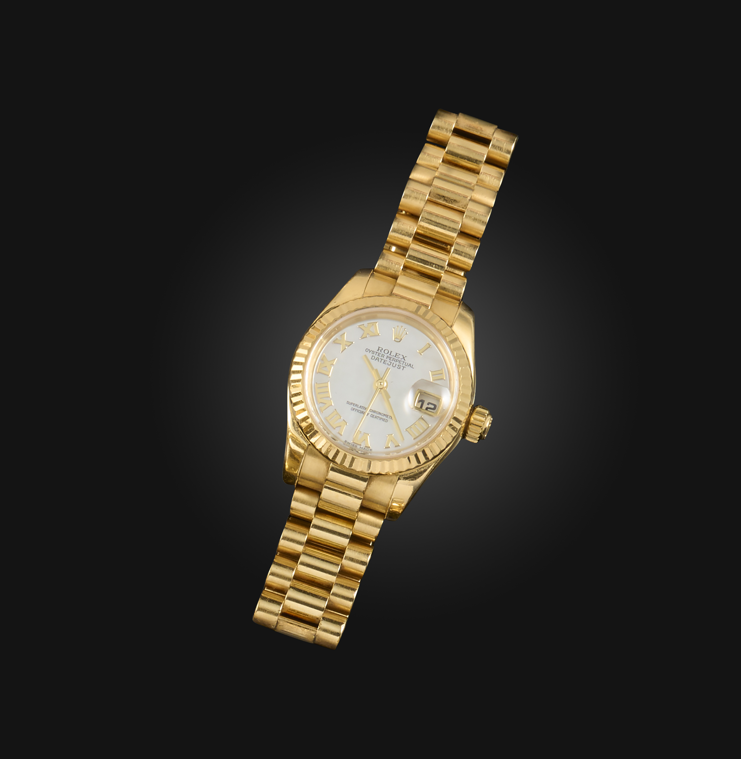 Rolex, a lady's gold DateJust wristwatch, signed mother of pearl dial with Roman numerals and date