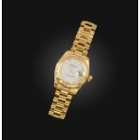 Rolex, a lady's gold DateJust wristwatch, signed mother of pearl dial with Roman numerals and date