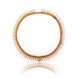 A Victorian pearl-set gold collar necklace, the fringe formed from small cannetille discs each