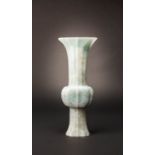 A LARGE CHINESE LOBED JADEITE GU-SHAPED VASE QING DYNASTY Of compressed quatrefoil-section, carved