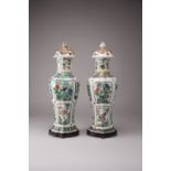 *A LARGE PAIR OF CHINESE FAMILLE VERTE QUATRELOBED BALUSTER VASES AND COVERS KANGXI 1662-1722 Each