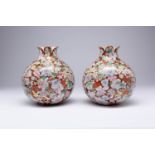A PAIR OF FAMILLE ROSE MILLEFLEURS POMEGRANATE-FORM VASES, SHILIUZUN REPUBLIC PERIOD Each brightly