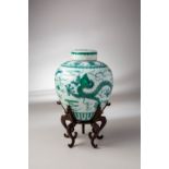 A FINE CHINESE IMPERIAL GREEN-ENAMELLED 'DRAGON' JAR AND COVER SIX CHARACTER QIANLONG MARK AND OF