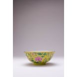 A CHINESE FAMILLE ROSE YELLOW-GROUND 'FLORAL' BOWL SIX CHARACTER XIANFENG MARK AND OF THE PERIOD