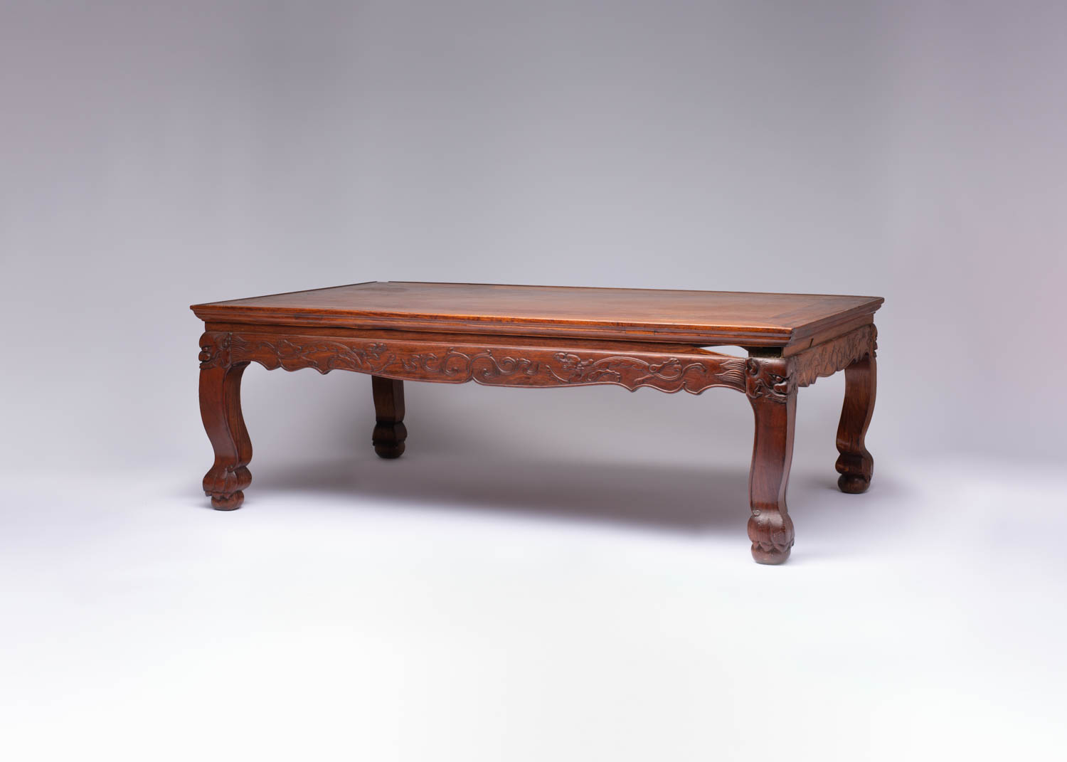 A CHINESE HUANGHUALI KANG TABLE QING DYNASTY The rectangular top above a shaped frieze carved in - Image 2 of 2