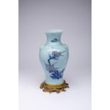 A CHINESE LAVENDER-GROUND, UNDERGLAZE BLUE AND COPPER-RED BALUSTER VASE 18TH/19TH CENTURY The body