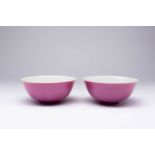 A PAIR OF CHINESE IMPERIAL PINK-ENAMELLED BOWLS SIX CHARACTER XUANTONG MARKS AND OF THE PERIOD