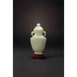A CHINESE PALE CELADON JADE RECTANGULAR-SECTION VASE AND COVER, PING QIANLONG/JIAQING The