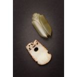 TWO CHINESE JADE CARVINGS HAN DYNASTY AND 19TH CENTURY The flattened celadon jade cicada of an