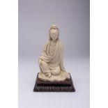 A CHINESE BLANC DE CHINE SEATED FIGURE OF WATER-MOON GUANYIN 17TH/ EARLY 18TH CENTURY The Goddess of