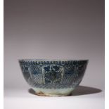 A LARGE SAFAVID BLUE AND WHITE BOWL 17TH/18TH CENTURY Rising from a straight foot, with gently