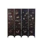 A CHINESE BLACK LACQUER EIGHTEEN LUOHAN FOUR-FOLD SCREEN LATE QING DYNASTY Inlaid with a variety