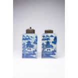 A PAIR OF CHINESE BLUE AND WHITE SQUARE-SECTION TEA CANISTERS C.1800 Painted with mountainous