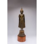 A LARGE THAI BRONZE STANDING FIGURE OF BUDDHA 18TH CENTURY With his hands facing forward and