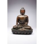 A LARGE TIBETAN COPPER REPOUSSE FIGURE OF BUDDHA LATE QING DYNASTY Seated in dhyanasana upon a lotus