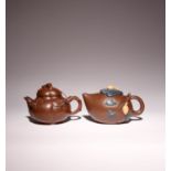 TWO CHINESE YIXING TEAPOTS AND COVERS 20TH CENTURY One decorated with ginkgo nuts and branches to