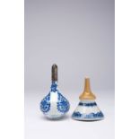 TWO CHINESE BLUE AND WHITE ITEMS KANGXI 1662-1722 One a wine funnel with a cafe au lait spout, the