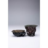 TWO CHINESE HARDWOOD LIBATION CUPS QING DYNASTY One in zitan, the other black wood, both supported