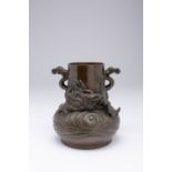 A JAPANESE BRONZE VASE MEIJI ERA, 19TH/20TH CENTURY The pear-shaped body decorated with a large