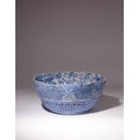 A LARGE JAPANESE SETO WARE BLUE AND WHITE MOULDED BOWL MEIJI OR LATER, 20TH CENTURY With an