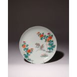 A JAPANESE KAKIEMON-STYLE DISH MEIJI ERA, 19TH CENTURY The well decorated in polychrome enamels with