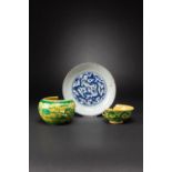 A CHINESE BLUE AND WHITE DISH AND TWO YELLOW-GROUND AND GREEN-ENAMELLED ITEMS JIAJING AND KANGXI