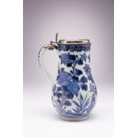 A JAPANESE ARITA BLUE AND WHITE TANKARD EDO PERIOD, C.1660-80 The baluster-shaped body decorated