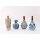 THREE CHINESE BLUE AND WHITE VASES AND A CRACKLED GLAZE VASE 17TH CENTURY AND EARLIER Painted with