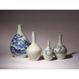 FOUR JAPANESE BLUE AND WHITE BOTTLE VASES EDO AND MEIJI, 18TH AND 19TH CENTURY All with a bulbous