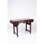 A CHINESE HARDWOOD ALTAR TABLE LATE QING DYNASTY The rectangular top with curved lingzhi scroll