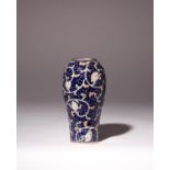A JAPANESE ENAMELLED VASE MEIJI ERA, 19TH/20TH CENTURY The baluster body with a dense design of