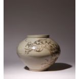A KOREAN IRON-PAINTED DRAGON JAR JOSEON OR LATER, 19TH OR 20TH CENTURY Of compressed ovoid form,