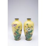 A PAIR OF JAPANESE CLOISONNE VASES MEIJI OR TAISHO, 20TH CENTURY With tall baluster bodies,