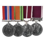 Four medals named or attributed to Warrant Officer Harold Edgar George Le Tissier Gange, Royal