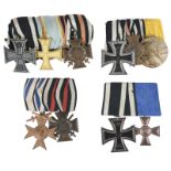 Imperial Germany: four unattributed medals groups, comprising: three: Iron Cross 1914 2nd class,