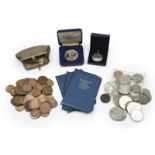 A quantity of British and international coins, including Georgian and Victorial low denomination