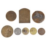 A collection of bronze medals and plaques, mainly representing Expositions and public works,
