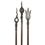 Three Chinese pole arms, ornamental or processional types, each with a heavy bronze head embellished