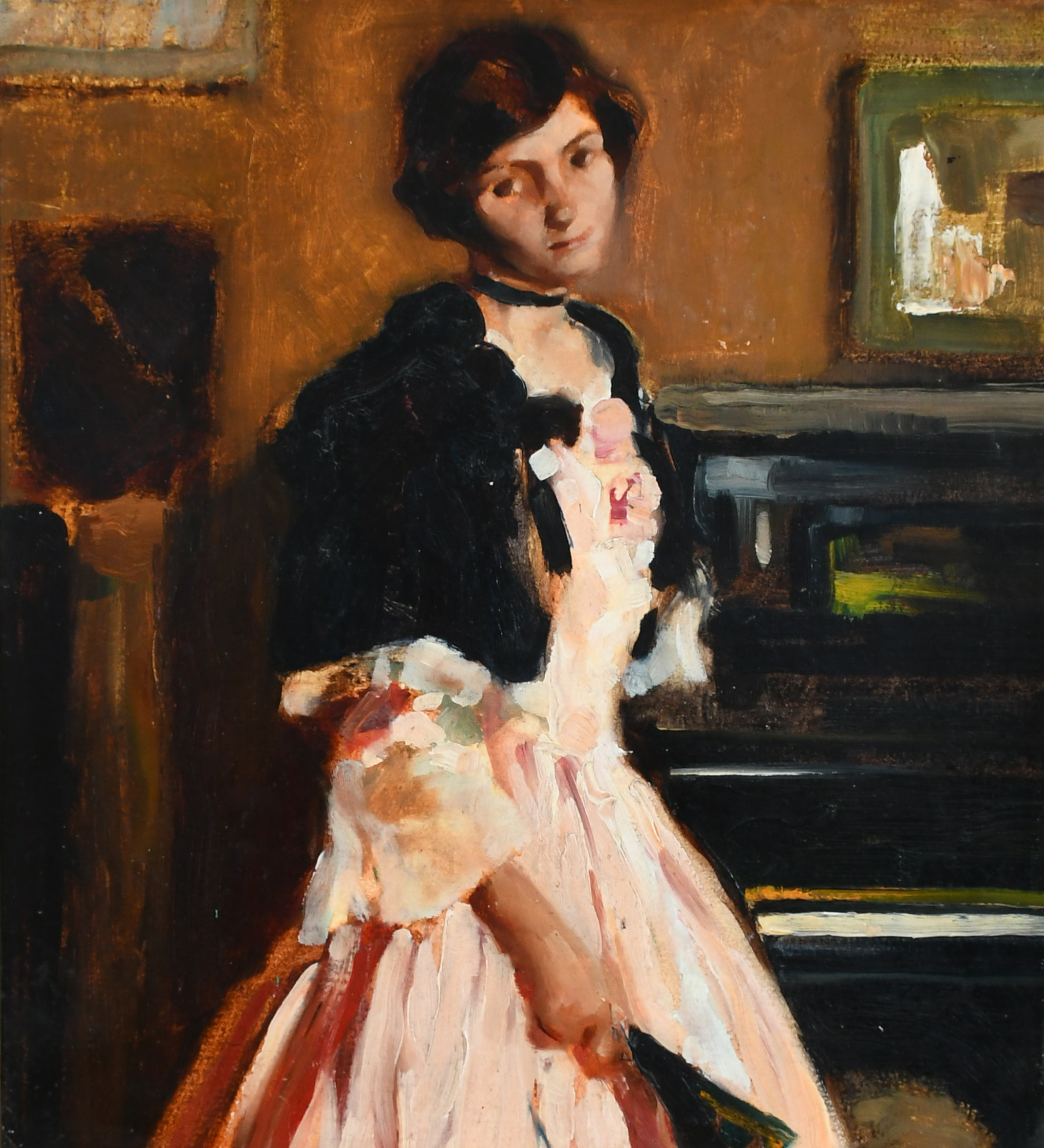 ‡Giannino Marchig (Italian 1897-1983) Portrait of a lady by a piano wearing a pink dress and holding