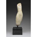 ‡Emily Young FRSB (b.1951) Torso Stone on a black marble base 25 x 7 x 5cm Provenance: The