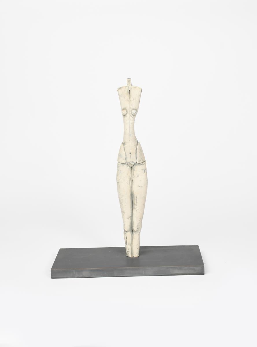 Mo Jupp (1938-2012) standing figure a hand built figure glazed white, on wooden base, 51cm. high