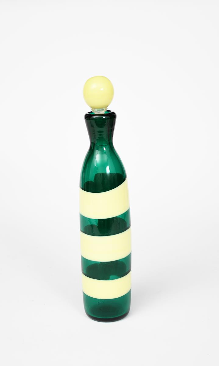 A Venini glass bottle and stopper designed by Fulvio Bianconi, emerald green glass with three
