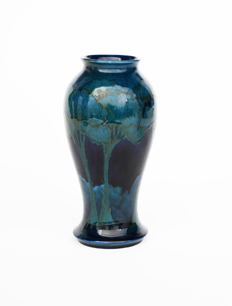'Moonlit Blue' a Moorcroft Pottery vase designed by William Moorcroft, baluster form, painted in