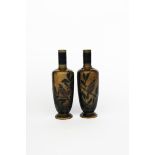 A pair of Martin Brothers stoneware vases by Robert Wallace Martin, dated 1879, slender bottle form,