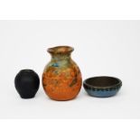 A Martin Brothers stoneware vase, ovoid with flaring rim, covered in a mottled tan glaze, with